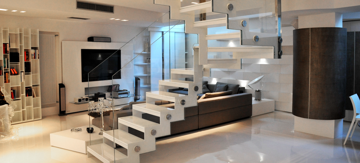White staircase in Corian and glass made by Arco Arredo