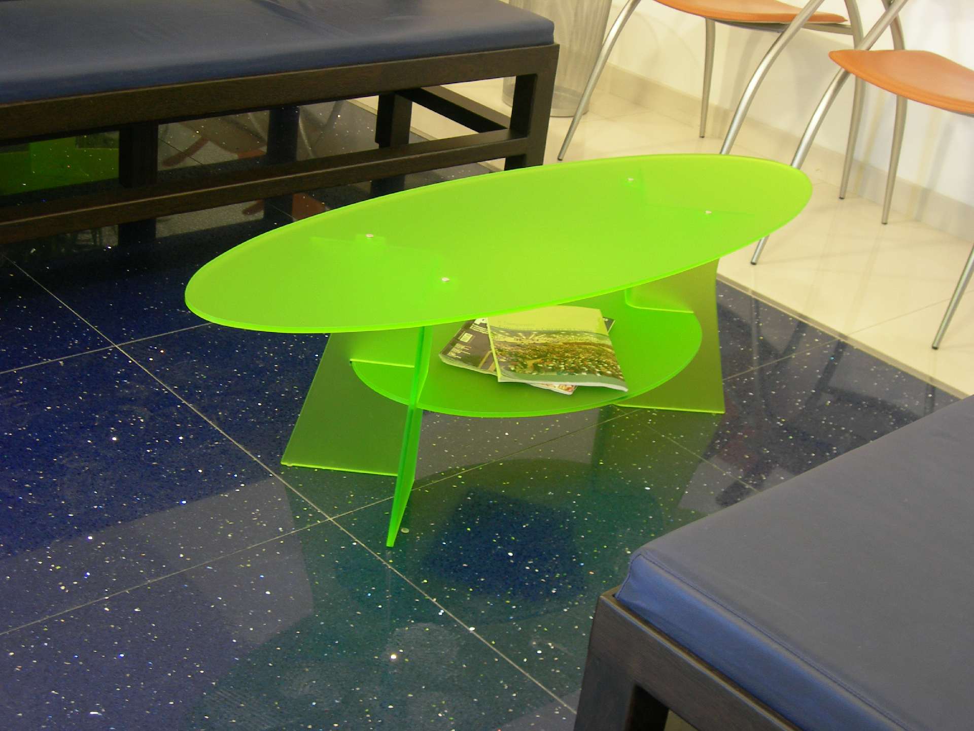Small table and bookcase in green methacrylate