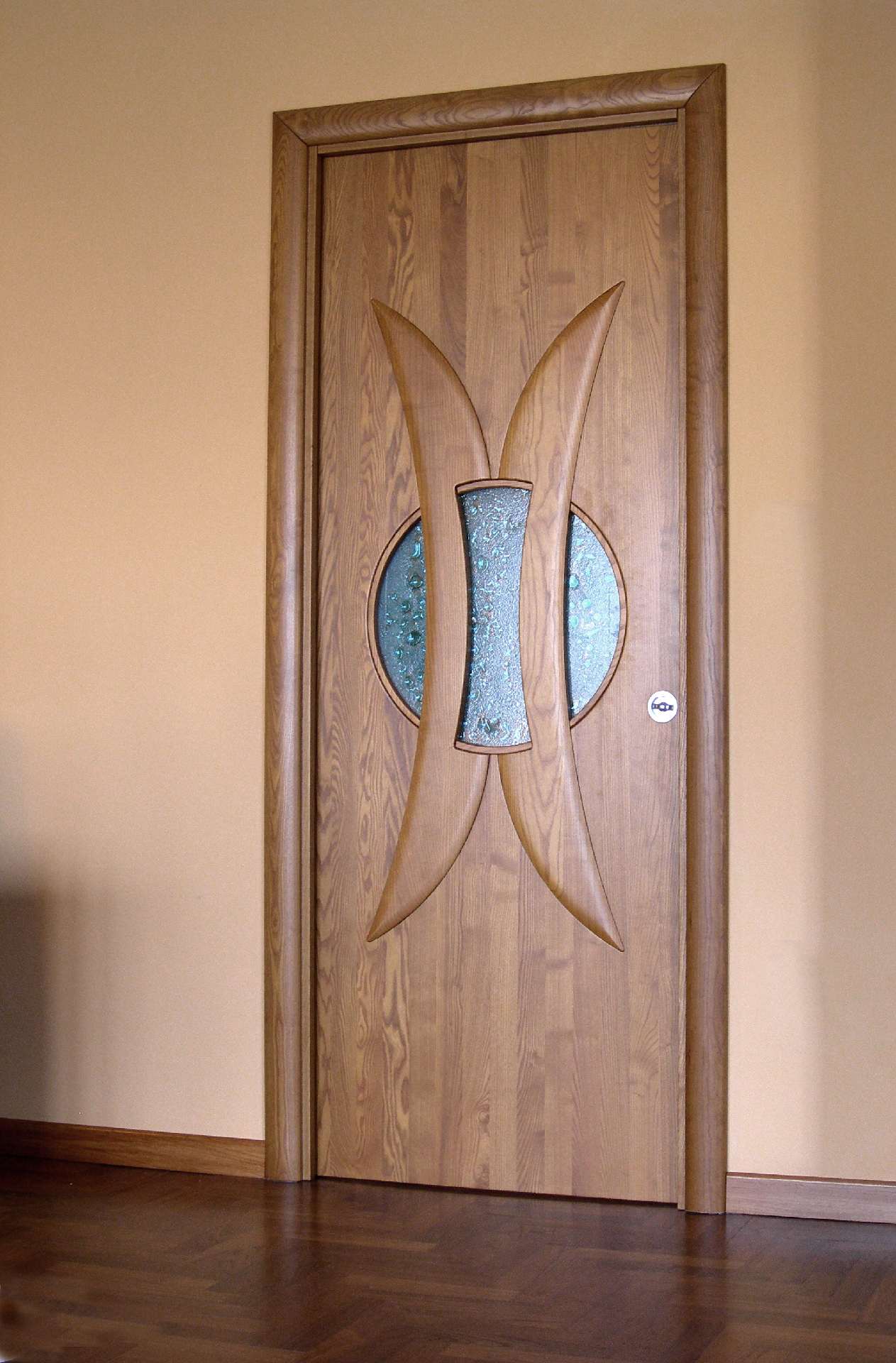 Bespoke timber door with an oval inset