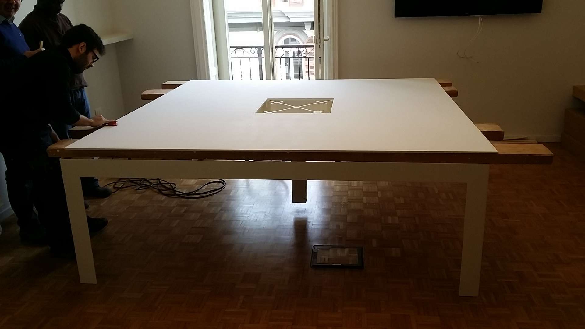 Assembling the table in the offices